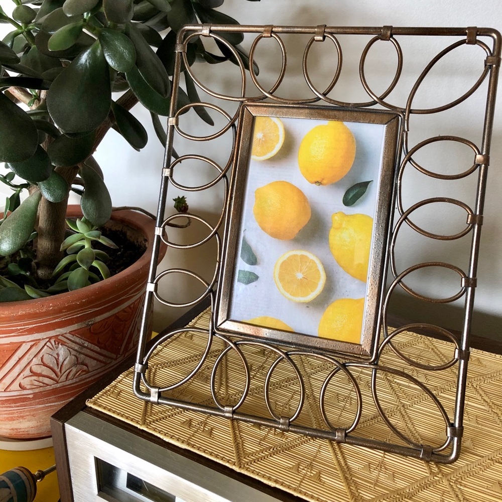 Whimsy brass photo frame